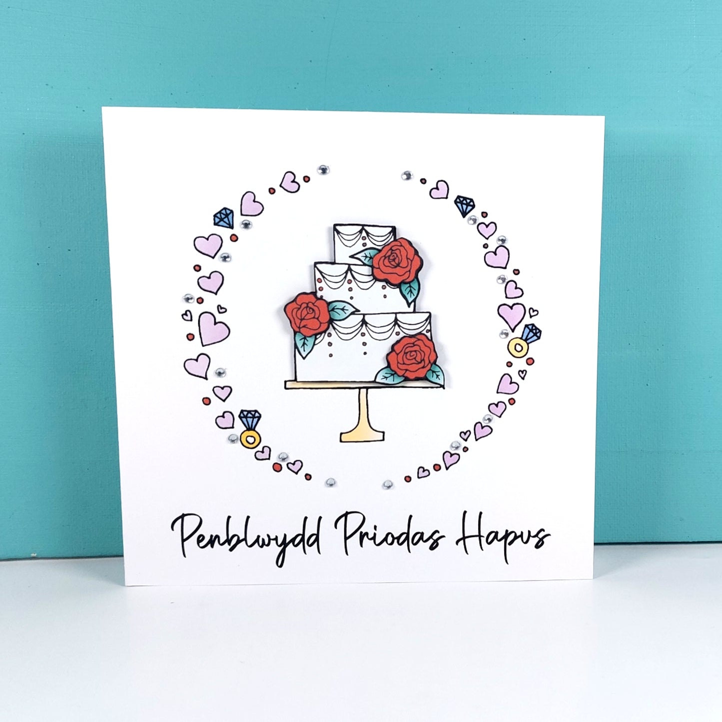 Penblwydd Priodas Hapus Card (Anniversary) Cake Red Roses - Welsh Card