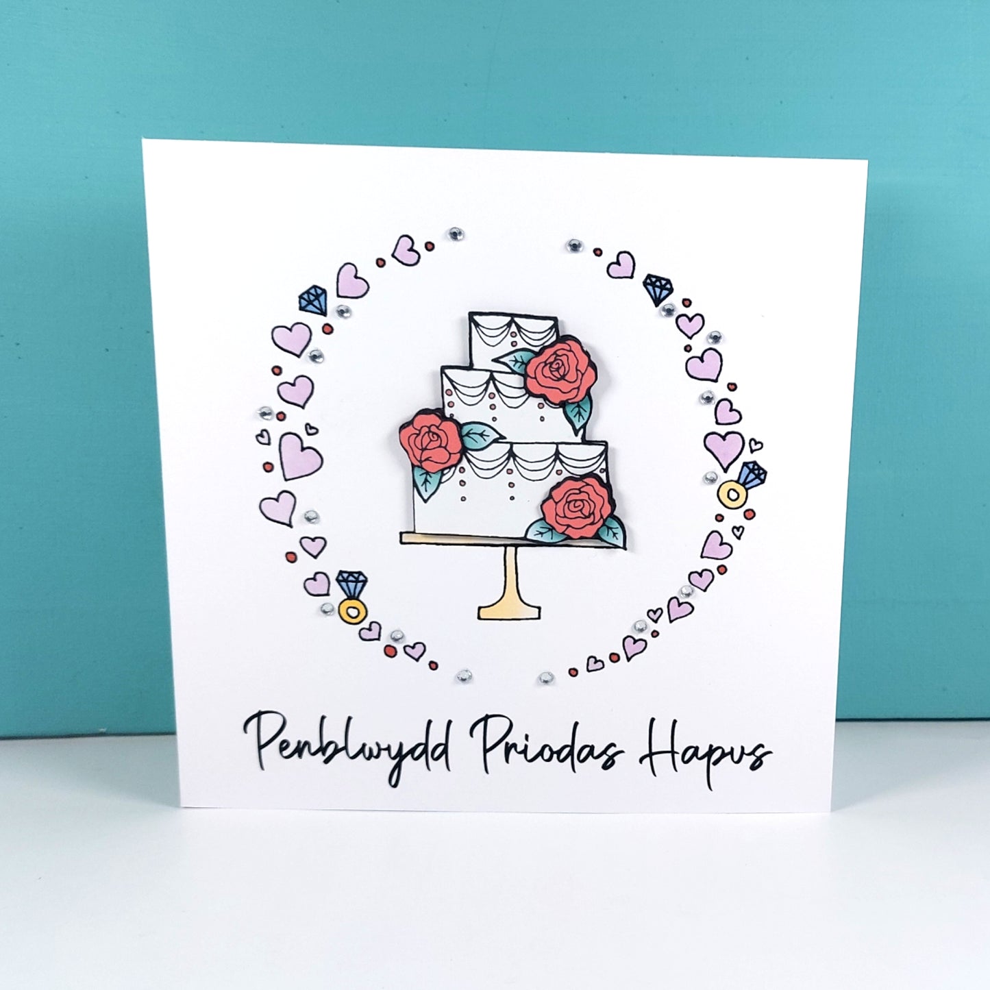 Penblwydd Priodas Hapus Card (Anniversary) Cake Pink Roses - Welsh Card
