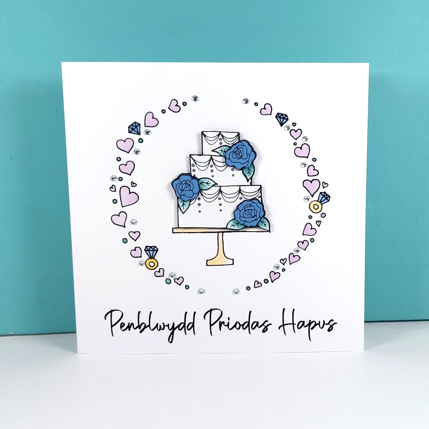 Penblwydd Priodas Hapus Card (Anniversary) Cake Blue Roses - Welsh Card