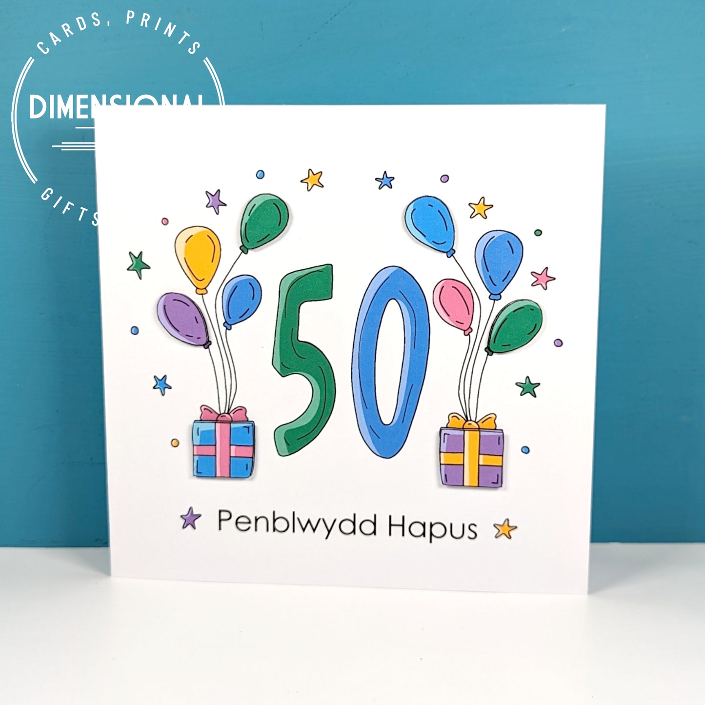 50th balloons and presents Penblwydd Hapus (Birthday) Card - Welsh