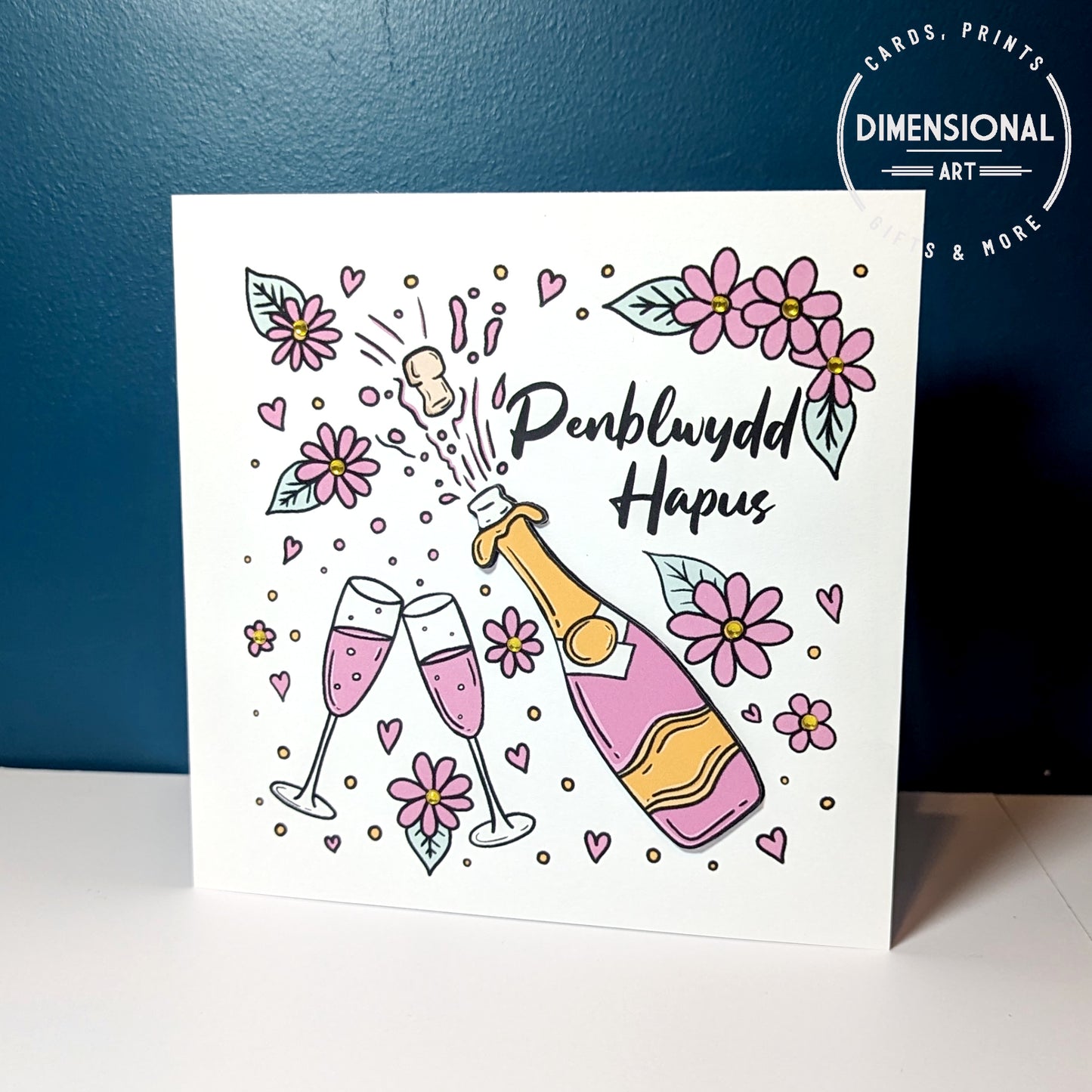 Pink Champagne and Flowers  Penblwydd Hapus (Birthday Card) - Welsh Card