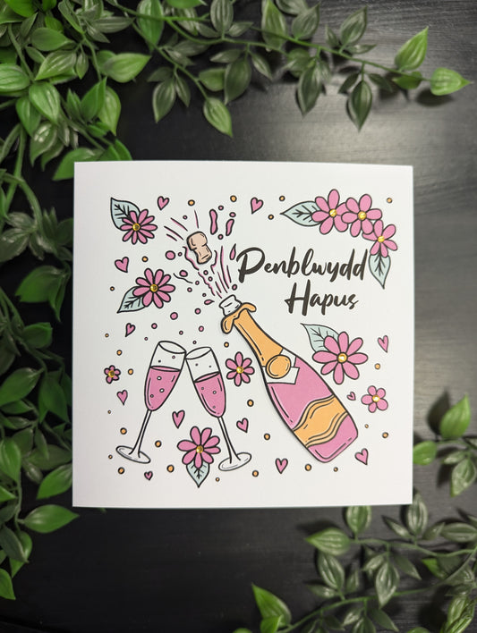 Pink Champagne and Flowers  Penblwydd Hapus (Birthday Card) - Welsh Card