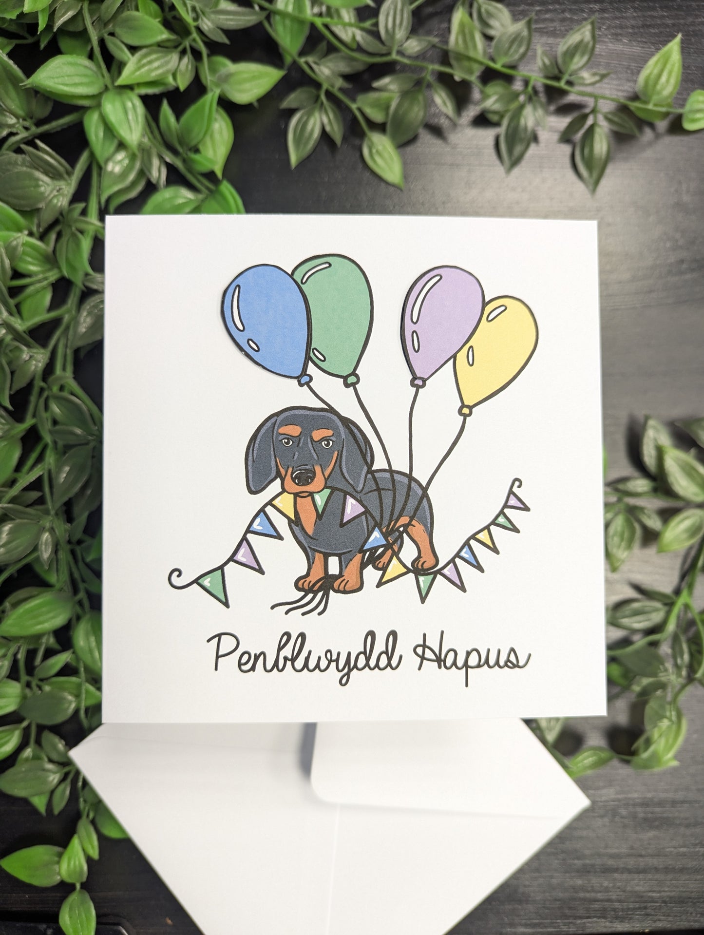Dachshund - sausage dog - Penblwydd Hapus (Birthday Card) Welsh Card